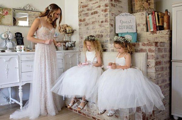 Our beautiful bride Casey wearing our "Dianthus" gown with her adorable flower girls in "Rose Bud" tulle gowns.