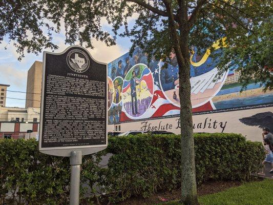 Juneteenth historic marker and "Absolutely Equality" mural by Reginald C. Adams