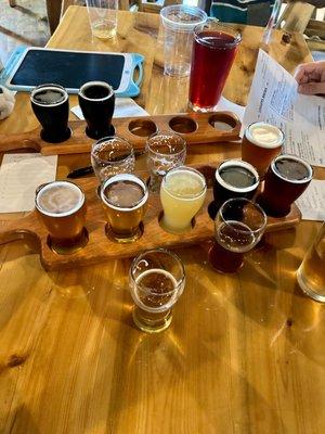 A Full flight of 12 beers on tap.