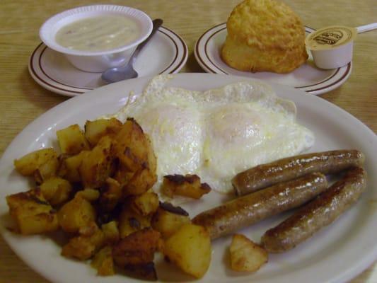 2 eggs, sausage links, hashbrowns and a biscuit, with a side of gravy