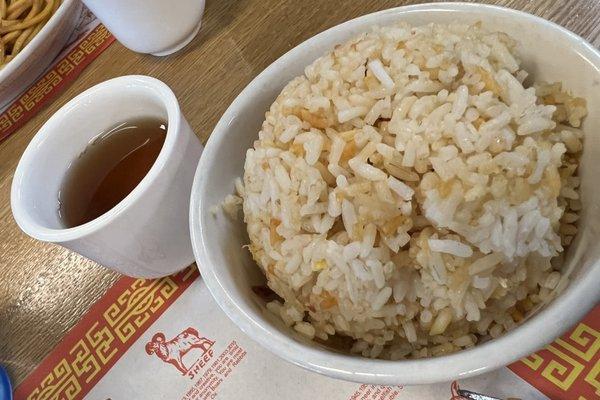 Side of fried rice and hot tea