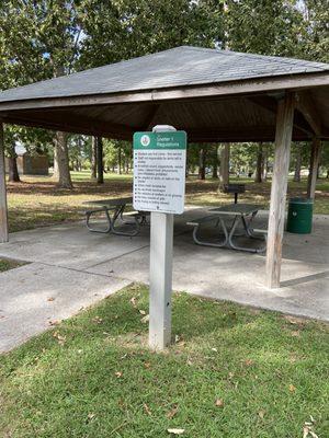 Covered shelter with picnic tables