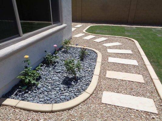 Rose garden bed with walkway.