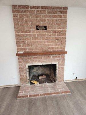 Brick fire place before the stucco