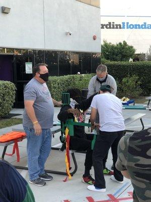 Rt. Fireman Wilder‍ (left) going over vehicle extrication tactics and routines