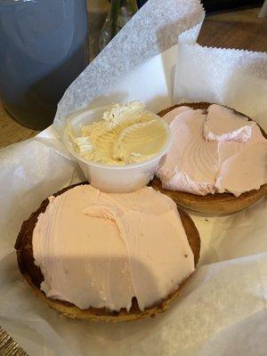 Strawberry cream cheese on an everything bagel