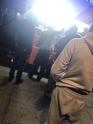 A line of 6 people in front of me at 9pm