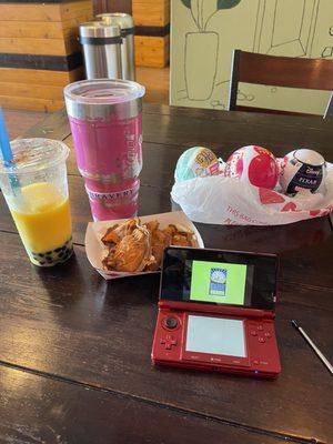 A Nintendo switch and fishy's with Boba inside and also a mango slush with extra Boba is my favorite