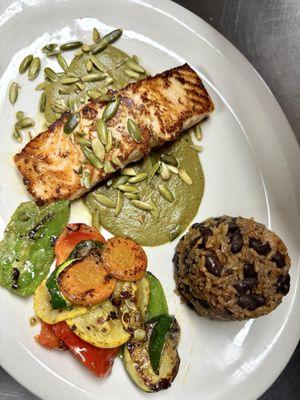 Salmon over Mole verde, with grilled vegetables and casamiento (rice and black beans)