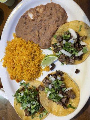 Taco plate Carne Asada and barbacoa with rice and Beans