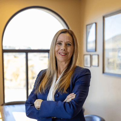 Attorney Caroline C. Cooley standing in Fourth Street Law conference room.