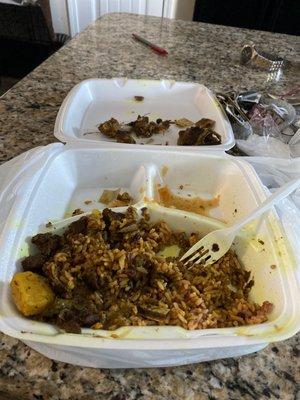 Large curry goat with rice and peas