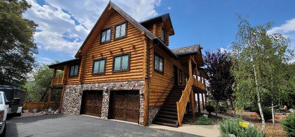 After sandblasting and a chemical strip,  we stained every inch if this log home in 2 tones.