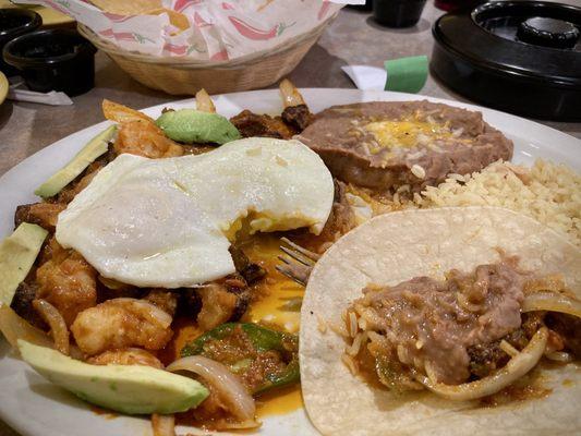 #5 Marin Special: shrimp, beef, onions, jalapeños, eggs, avocados, rice, beans, tortillas