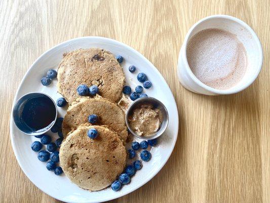 Banana pancakes (with almond butter and fruit add-ons) and super human tonic. Actual BEST pancakes!