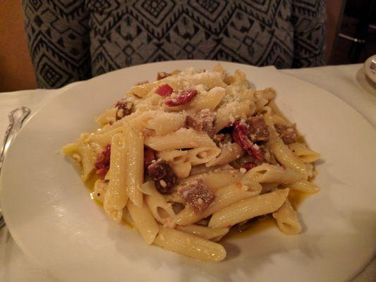 Sausage with artichokes and sun-dried tomatoes.