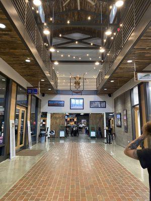 The entrance of the Cattle building showing the bar in the back.