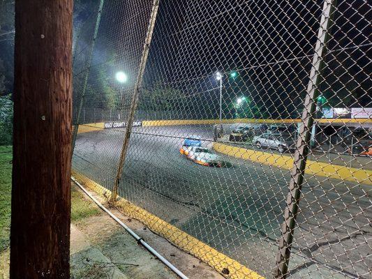 Late Model Stock Cars compete in the NASCAR Advance Auto Parts Weekly Series at Wake County Speedway.