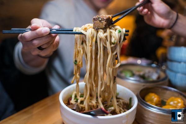 some posing taiwanese pork noodles