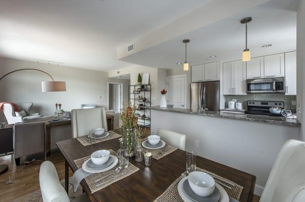 Breakfast Bar, Pendant Lighting and Bright Living Spaces Welcome You Home