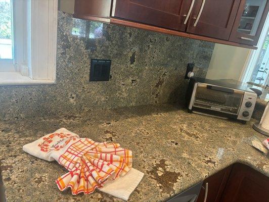 Kitchen counter with cute towel decoration