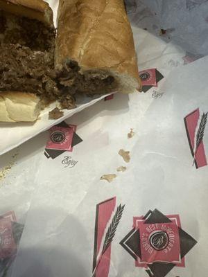 Steak and Cheese Sub with bones in it