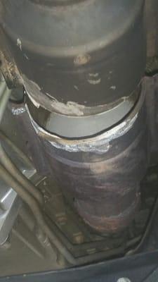 Old catalytic converter - split shows interior which was a glowing red color prior to coil replacement.