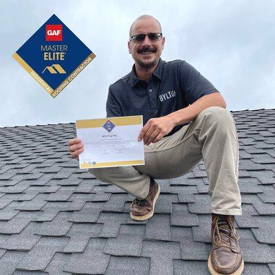 BYLTup Co-Founder, Brady Woodside, showcasing our GAF Master Elite Certification, placing BYLTup in the top 2% of roofing contractors.