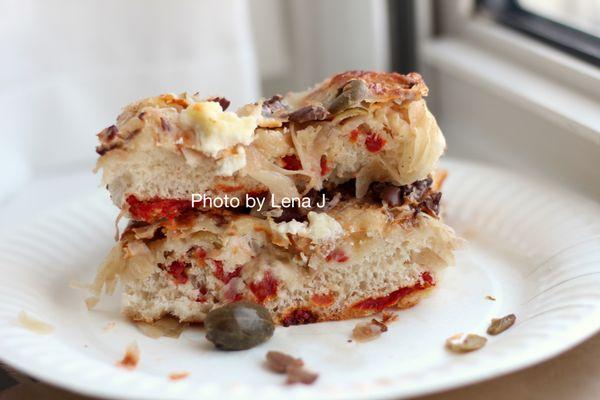 Focaccia with Mozzarella, Caramelized Onions, Olives ($4.95) - great, super flavorful