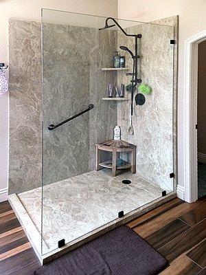 Modern Shower Install: glass wall and multiple shower shelves