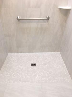 Shower and flooring done by Aaron @ Designer Lifestyles. He's a real craftsman! Shower door next!