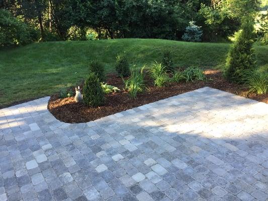 Stone patio and garden bed