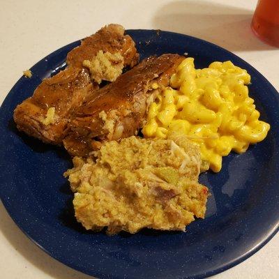 1st plate, mac and cheese, smothered ribs, and dressing