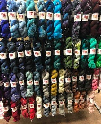 Colorful selection of Neighborhood Fiber yarns.