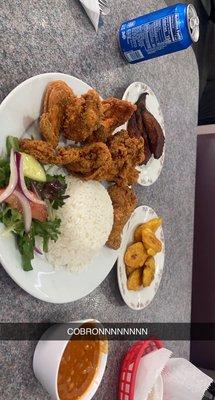 Fried Chicken, sweet plantains, salty plantains, red White Rice and Beans, small salad