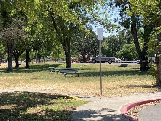 Bench seating plus a grill on your left. Would recommend some kind of portable shade especially during the summer months. (July 2023)