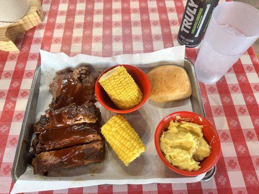 2 meat combo brisket and ribs with corn on the cob and mustard potato salad sides