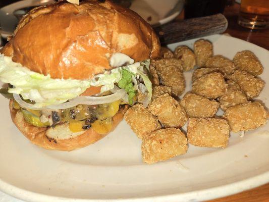 Wagyu burger with grilled jalapeños and tots