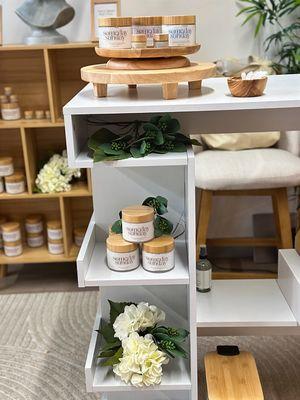 A beautiful display of our body cream and lip butters at our retail location. We have testers for you to try any scent or product!