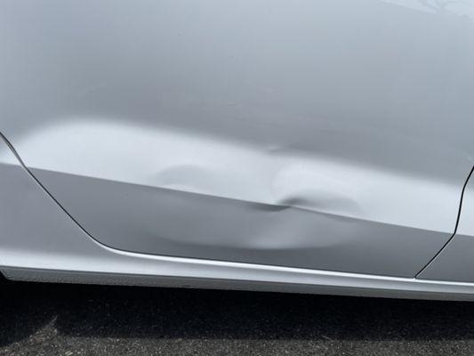 Audi door severe dent