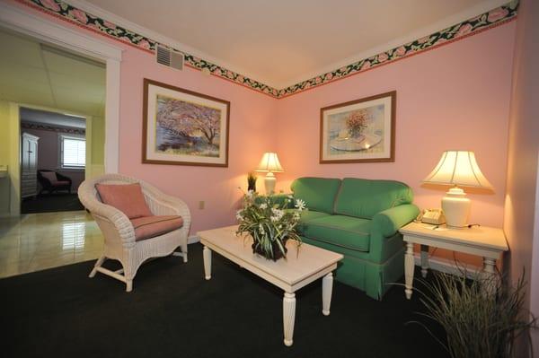 Island View Handicap Accessible Suite with one King Bed. This view shows the separate living room.