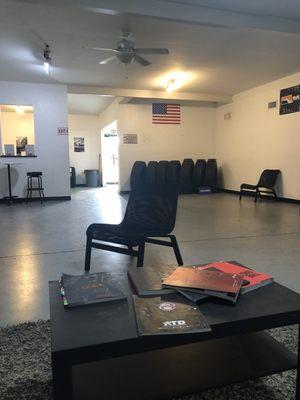 Waiting area, TV and snack machine are off to the left. Lots of space in here!