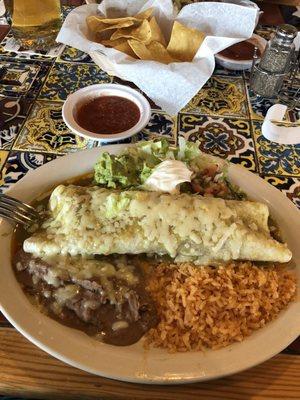 Burrito Mexicans with green sauce only, not the other two listed on the menu.  Inside is chicken, beef, and shredded pork.