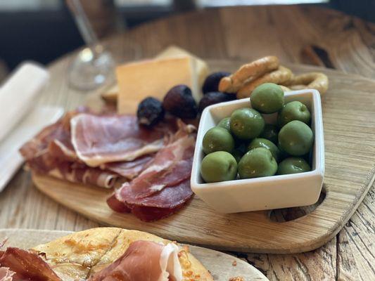 Charcuterie mixed meat and cheese.