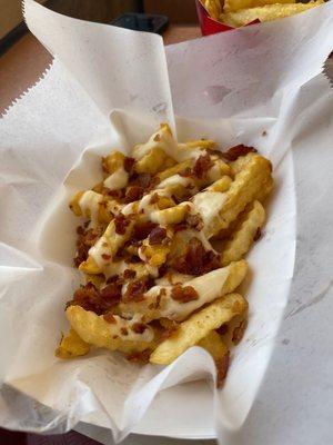 Cheesy Bacon Pub Fries...not half as good as they look.  Bland.  Expensive ($3.99 & tax).