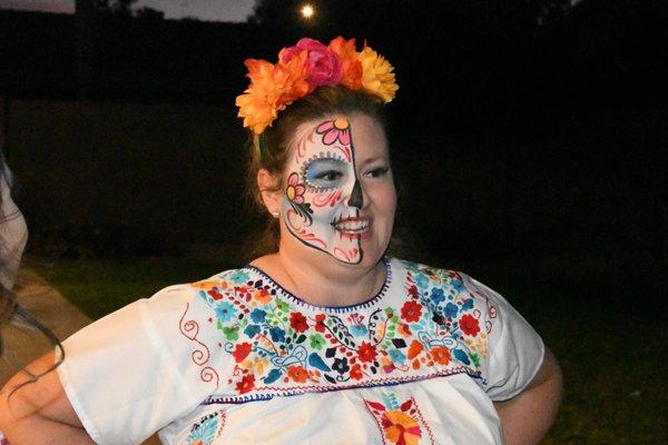 I didn't think I'd have time to get my face painted since I was running around as the hostess, but she was FAST!!