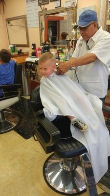 First professional haircut at Tlatoani barber shop.