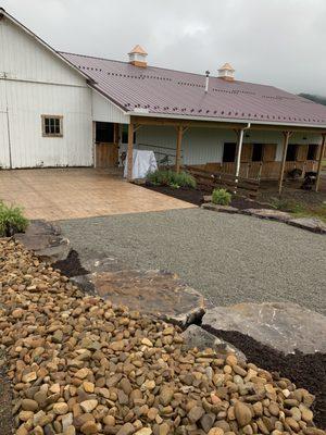 Fire pit area lined with boulders to sit on.