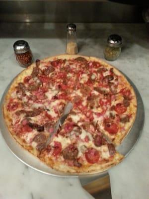 This is a delicious deep dish meat lover pizza, only $3.75 by slice..with sausage, pepperoni, meatballs, ham and bacon..