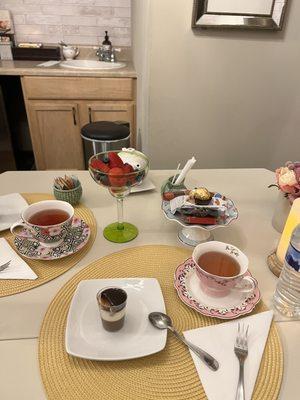 Tea, fruit, chocolates